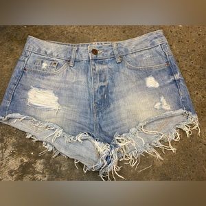 Divided‎ distressed blue Jean shorts